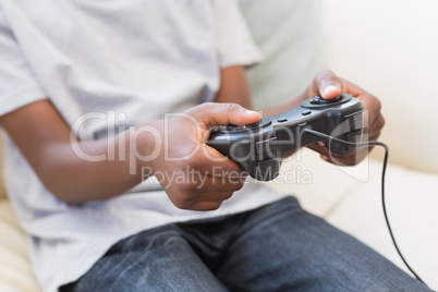 Little boy playing video games