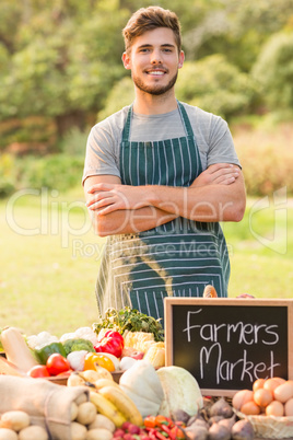 Handsome farmer standing arms crossed