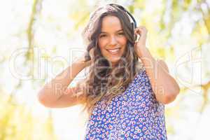 Pretty brunette with headphones