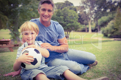 Happy father with his son at the park