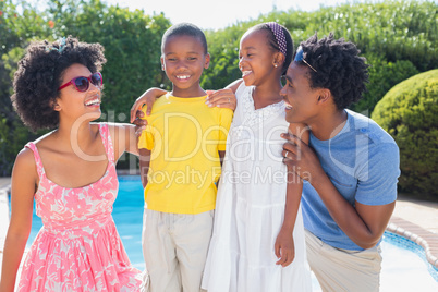 Happy family smiling at each other Happy family smiling at each other