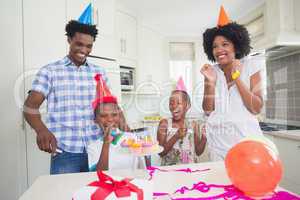 Happy family celebrating a birthday together