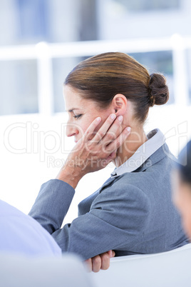 Sad businessman sitting at his desk