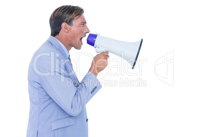 Businessman talking through megaphone