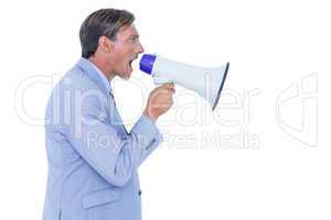 Businessman talking through megaphone