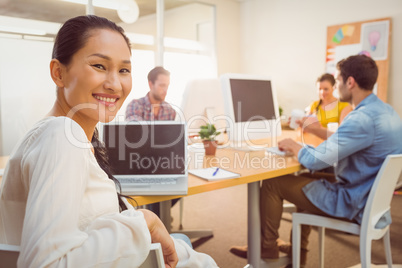 Smiling businesswoman looking at the camera