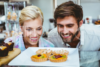 Cute couple on a date looking at fruit pie