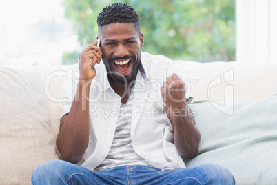 Excited man on the phone