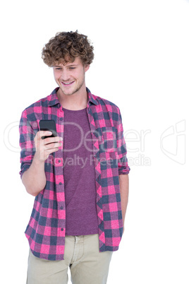 Happy handsome man using his smartphone