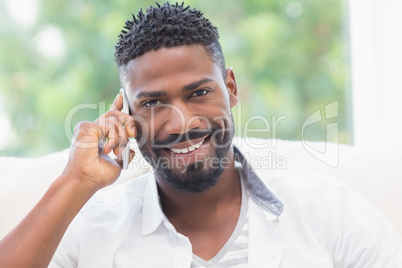 Happy man on the phone