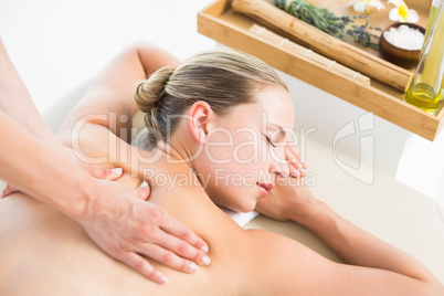 Woman enjoying a back massage