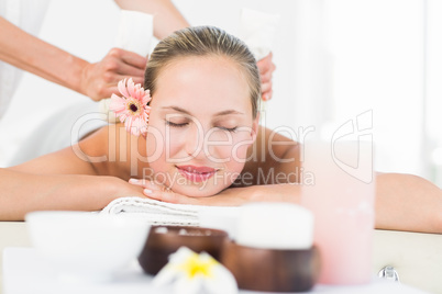 Pretty blonde enjoying a massage