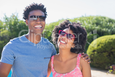 Happy couple smiling at camera