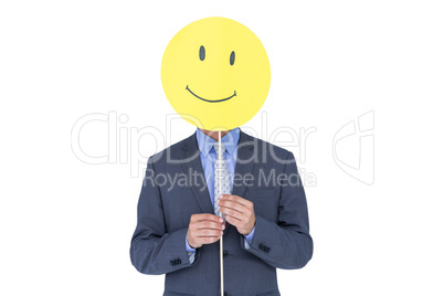 Businessman with happy smiley faced balloon