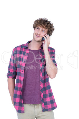 Happy handsome man having phone call