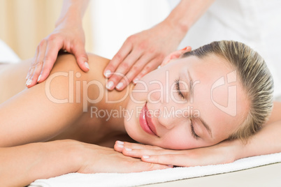 Pretty blonde enjoying a massage