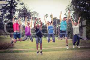 Happy athletic jumping together