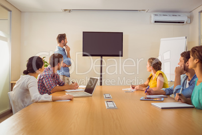 Attentive business team following a presentation