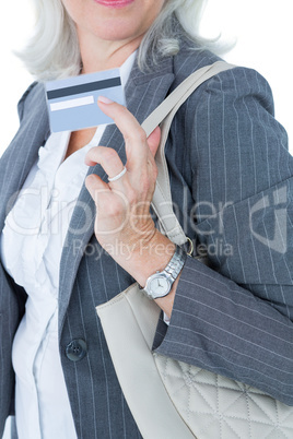 Businesswoman showing her credit card