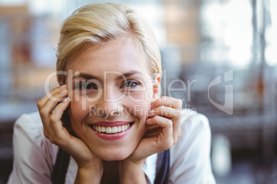 Selfassured female waitress smiling