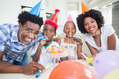 Happy family celebrating a birthday together