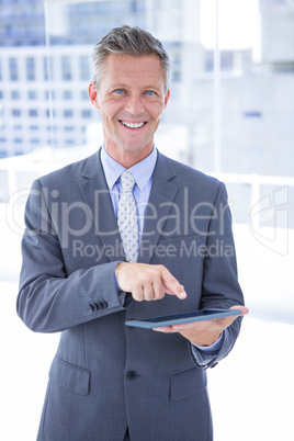 Businessman holding a tablet