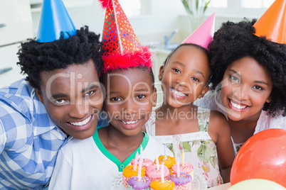 Happy family celebrating a birthday together