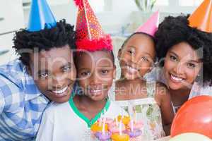 Happy family celebrating a birthday together