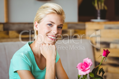 Pretty blonde woman looking at camera