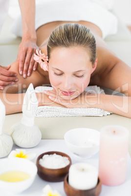 Pretty blonde enjoying a massage