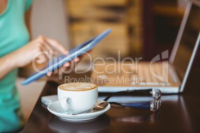 A woman using tablet computer