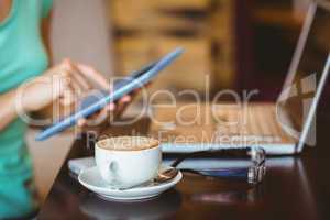 A woman using tablet computer