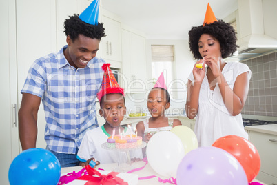 Happy family celebrating a birthday together