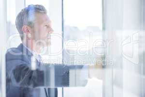 Thinking businessman in the office