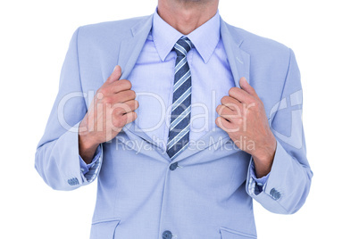 businessman holding his jacket