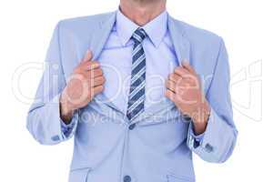 businessman holding his jacket