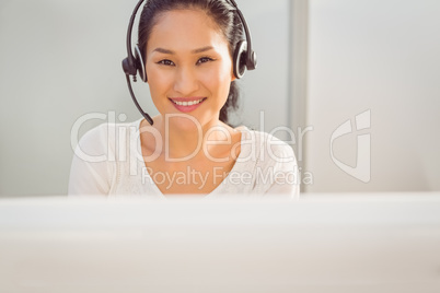 Call centre representative using headset