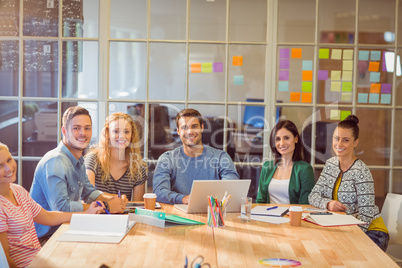 Group of young colleagues using laptop