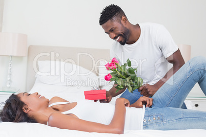 Romantic man giving roses to partner