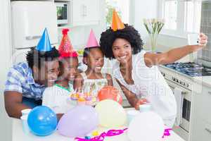 Happy family celebrating a birthday together