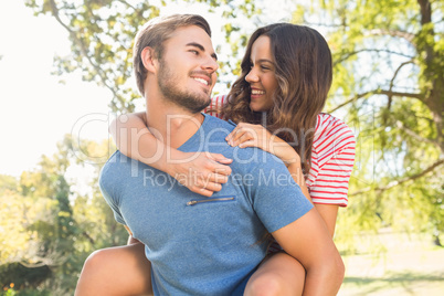 Cute couple having fun in park