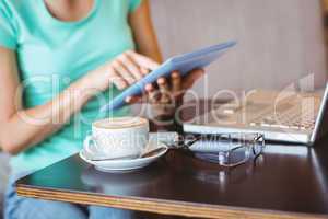 A woman using tablet computer