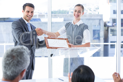 Business team smiling at camera