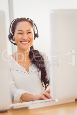 Call centre representative using headset