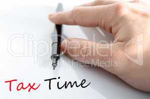 Pen in the hand tax time concept