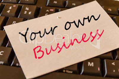 Your own business concept on keyboard
