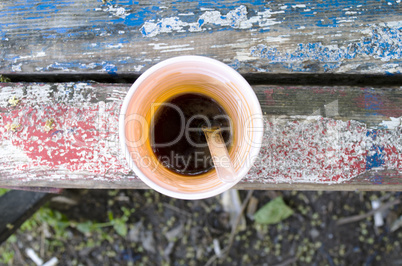 Espresso coffee on old wooden bench