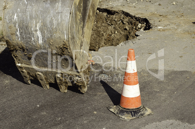 Public street maintenance works, excavator