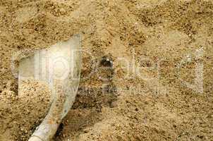 Shovel in a sand