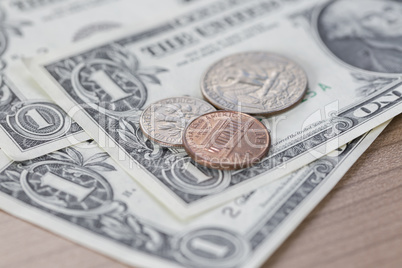 Closeup of Dollar Notes and Coins